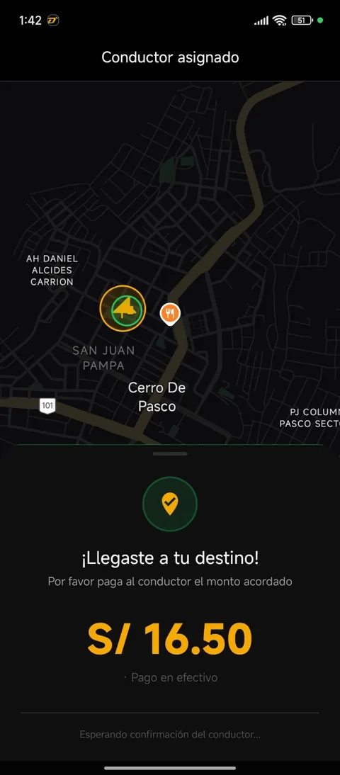 Pantalla de llegada al destino con el monto a pagar en efectivo.